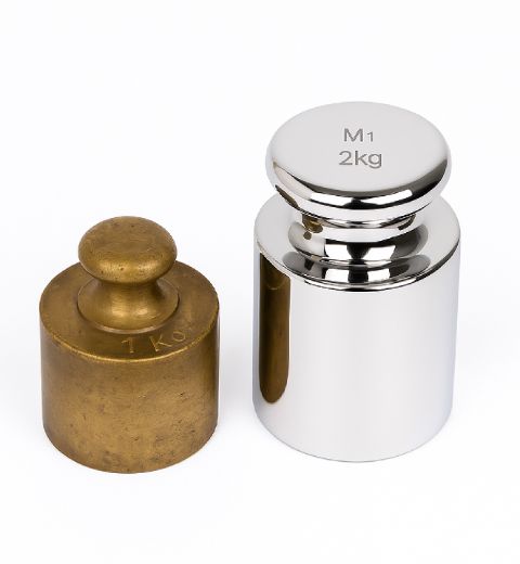 pesas patrón acero inoxidable, calibración de pesas, masa patrón, metrología de masa, precisión en pesaje, estándares metrológicos